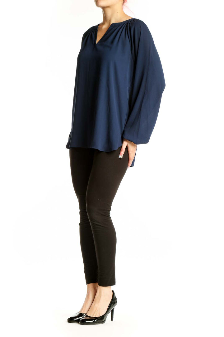 Front view of navy Pleione V-neck long sleeve blouse