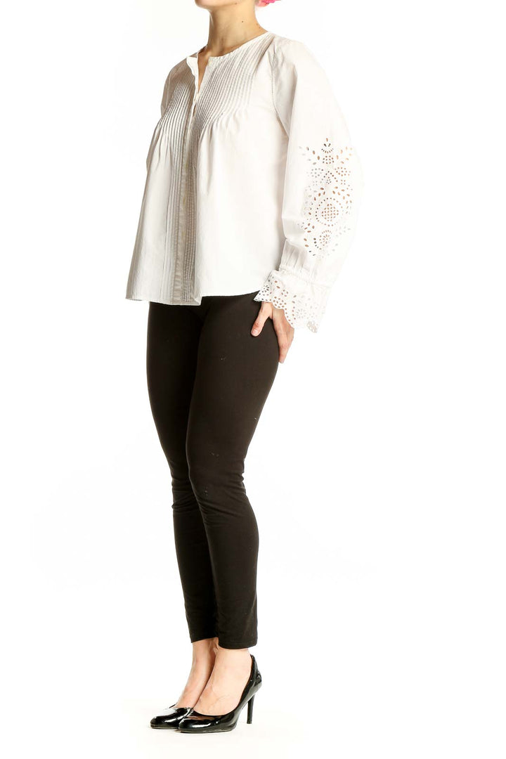 Front view of white Joie cotton blouse with pintuck detailing