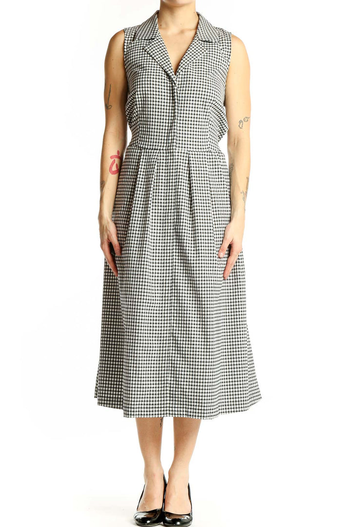 Front view of Donna Karan New York black and white gingham sleeveless midi dress