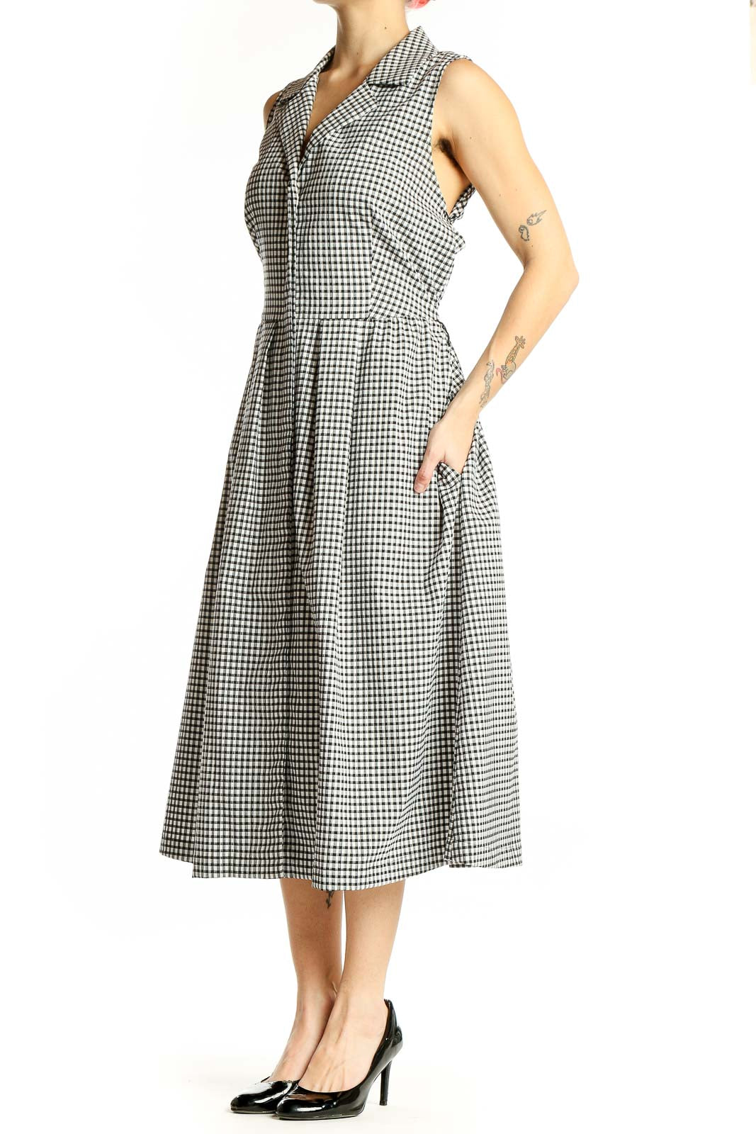 Front view of Donna Karan New York black and white gingham sleeveless midi dress