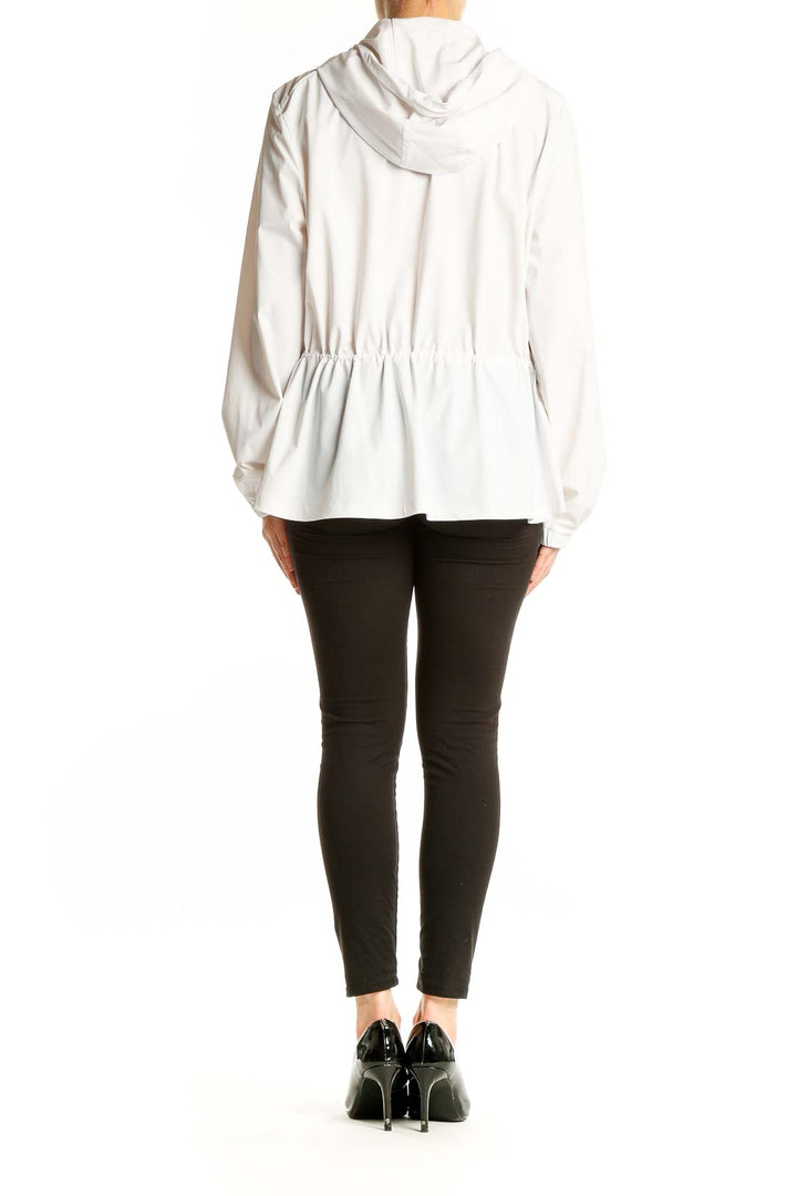 Side view of white Tommy Bahama hooded jacket on model