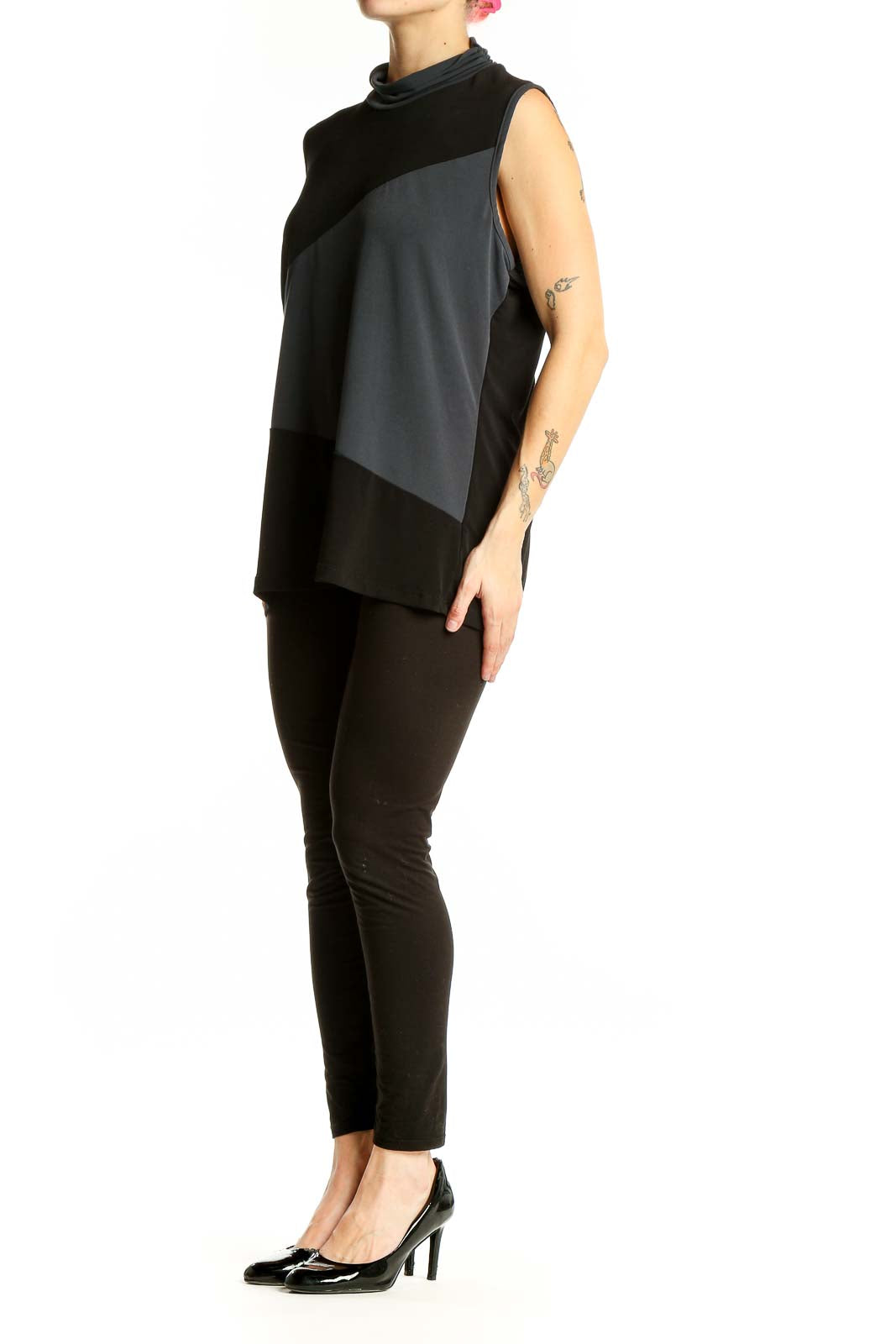 Front view of Lane Bryant black and gray color block sleeveless top with cowl neck