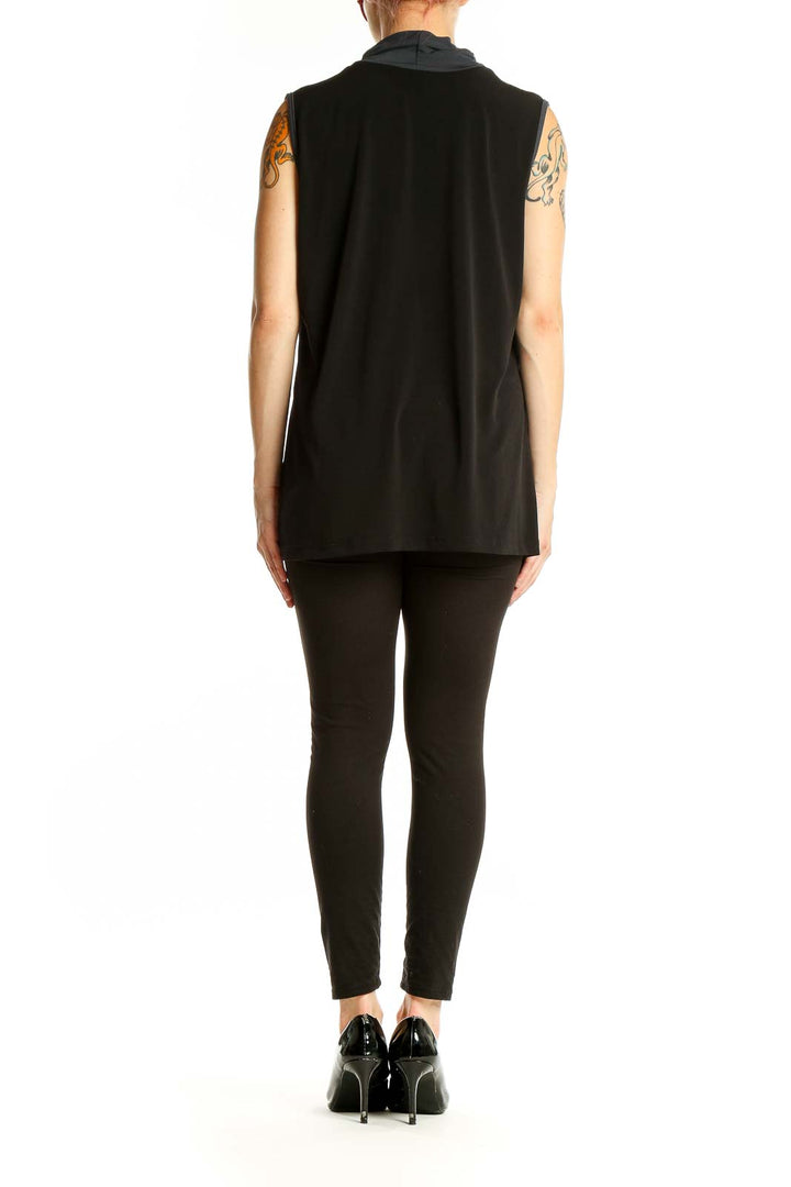 Side view of Lane Bryant black and gray color block sleeveless top on model