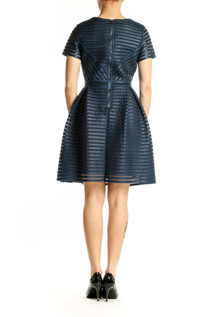 Side view of Aqua navy textured fit-and-flare dress