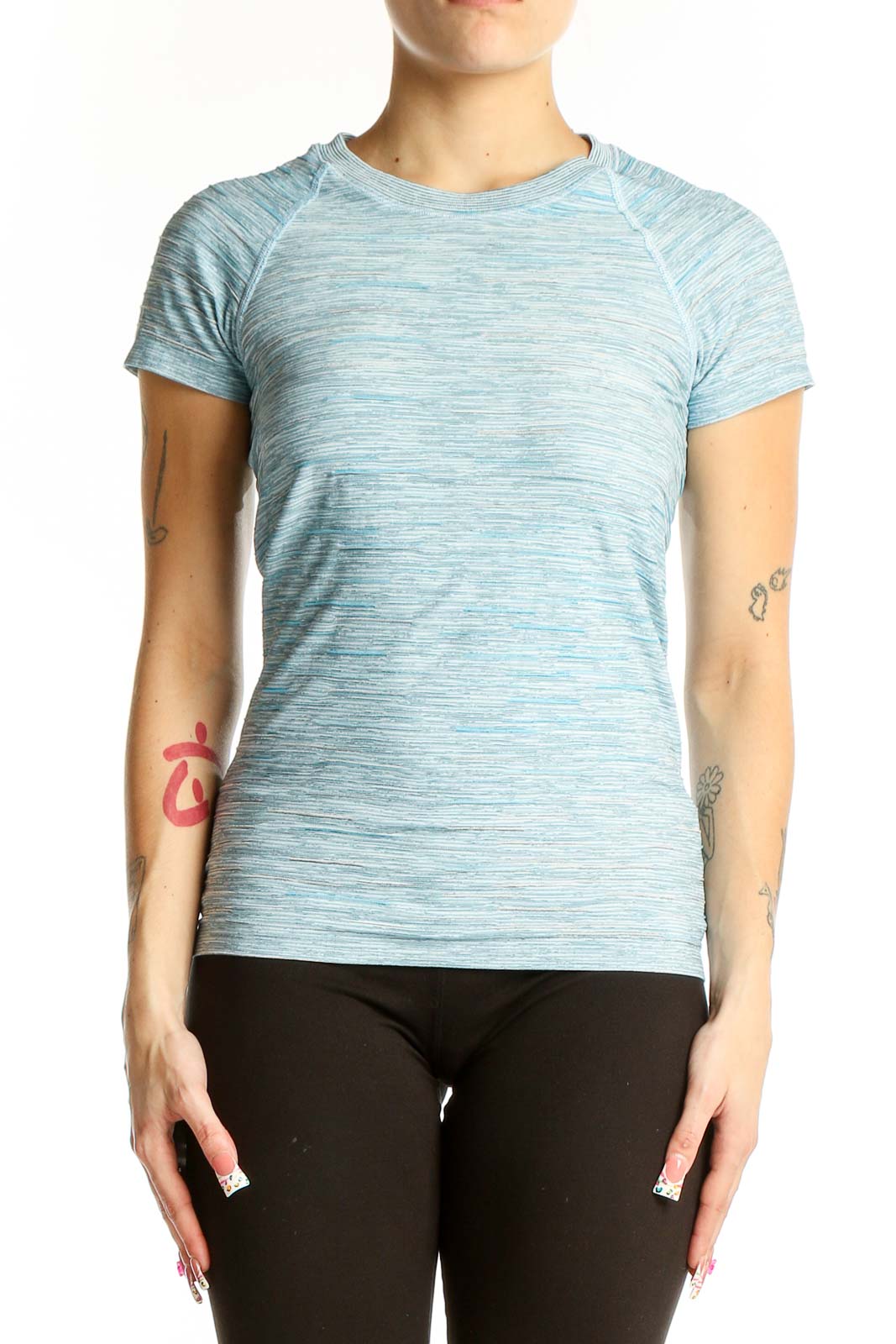 Front view of Athleta light blue heathered performance t-shirt on model