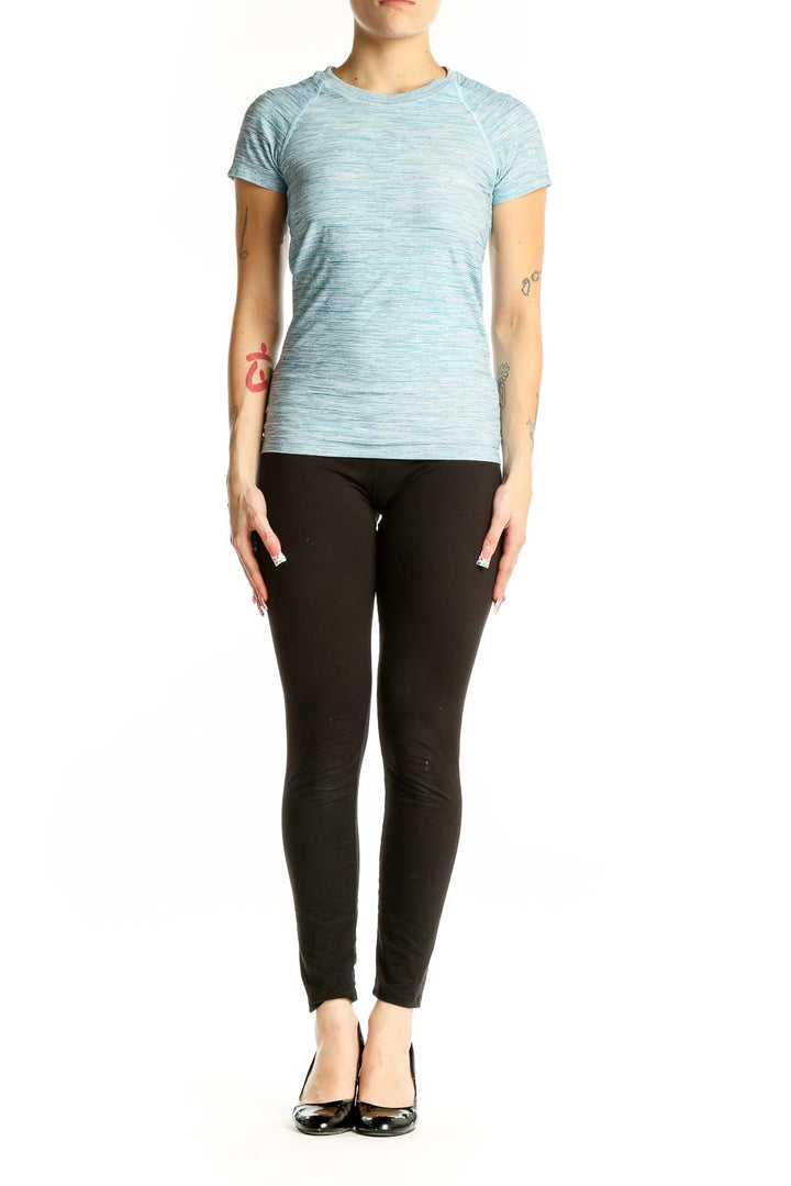 Front view of Athleta light blue heathered performance t-shirt on model