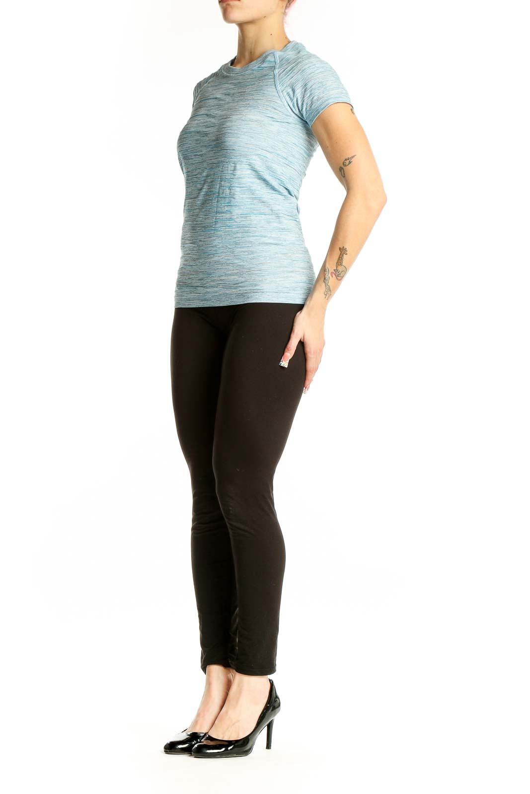 Front view of Athleta light blue heathered performance t-shirt on model