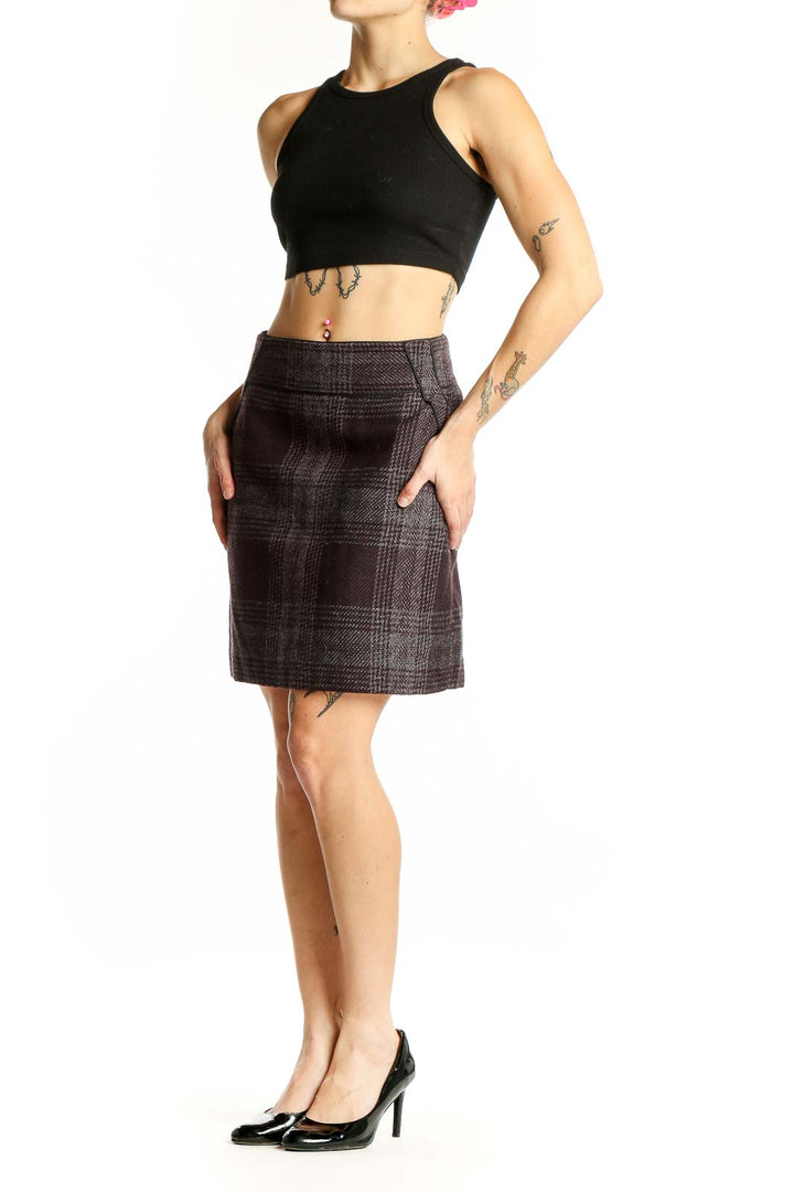 Front view of Ann Taylor LOFT brown plaid mini skirt with side pockets