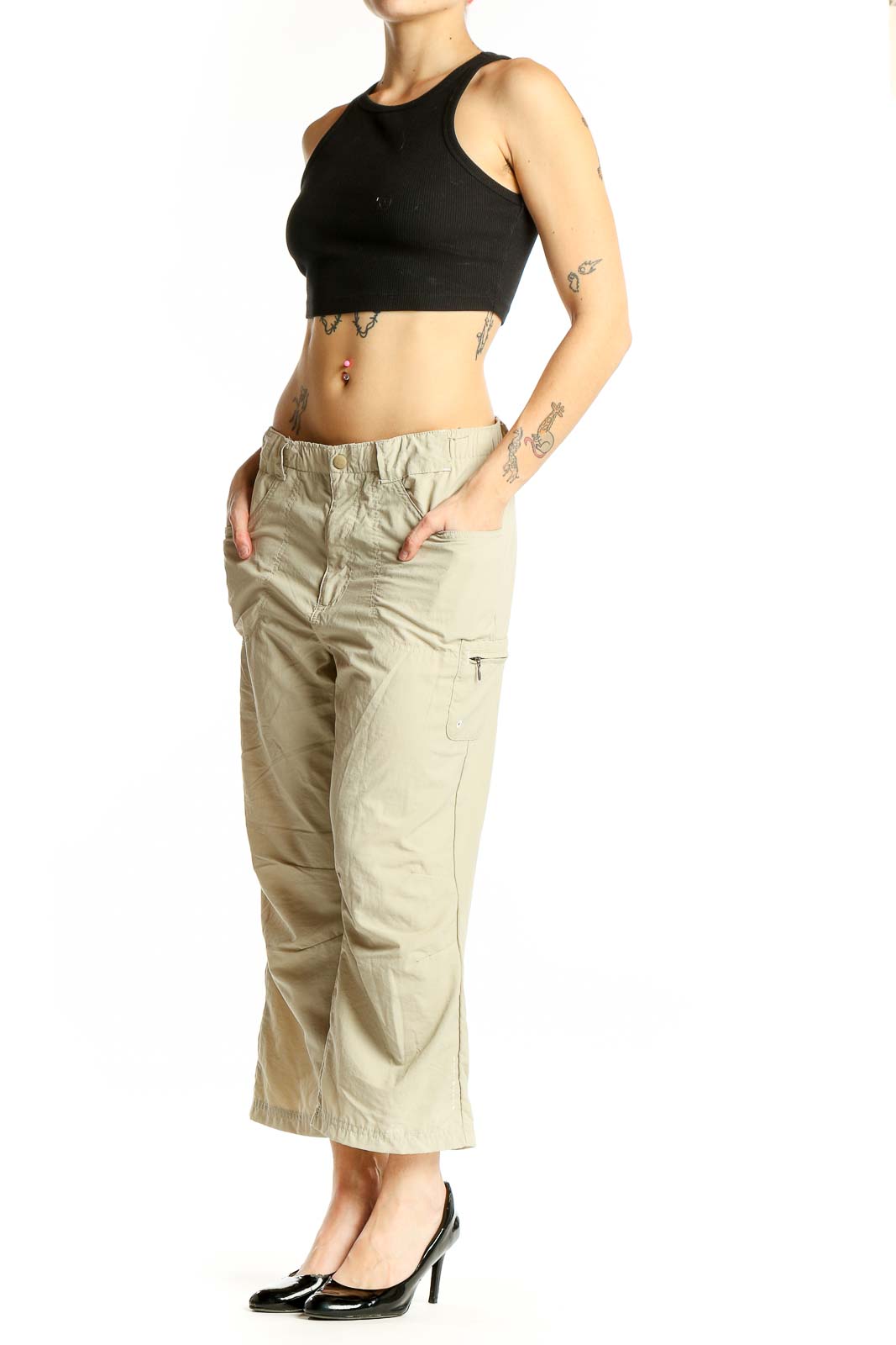 Front view of beige Columbia nylon cropped cargo pants on model