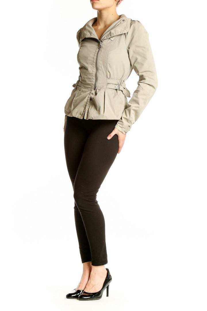 Front view of Armani Exchange beige zip-up peplum jacket