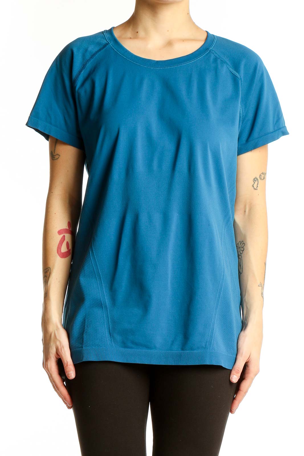 Front view of blue Athleta performance short sleeve top