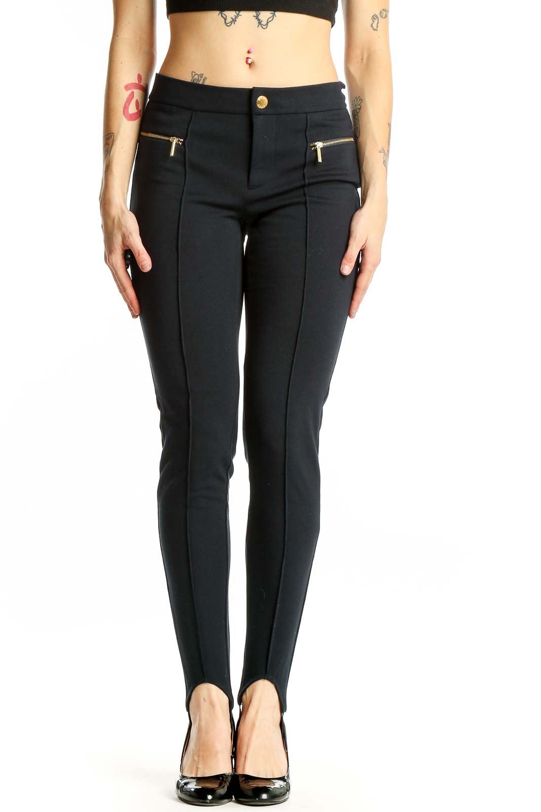 Front view of Michael Kors black stirrup pants with gold-toned zip pockets