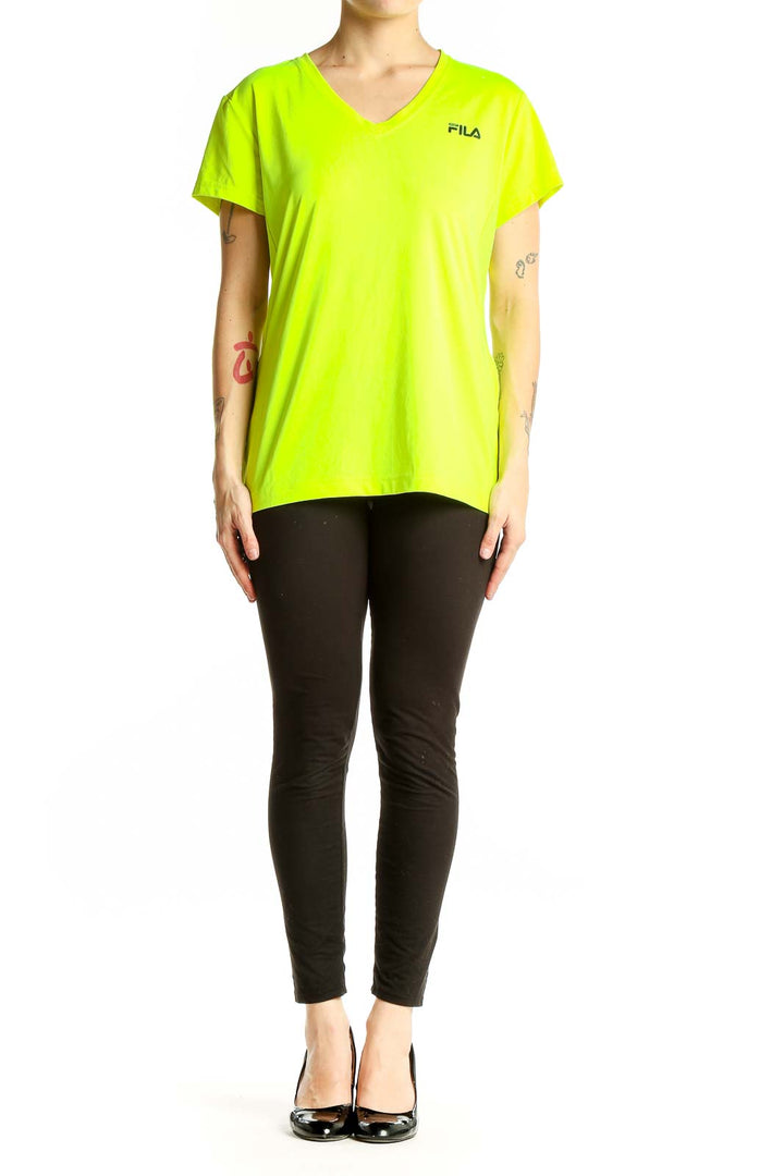 Front view of neon yellow Fila V-neck athletic top