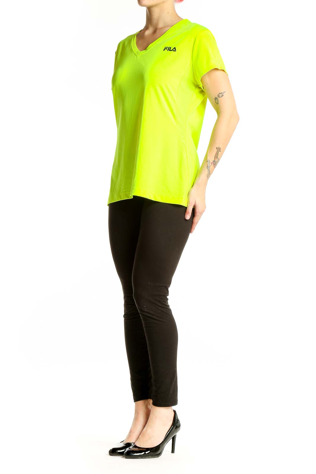 Front view of neon yellow Fila V-neck athletic top