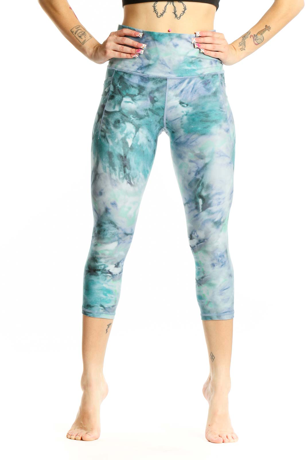 Front view of teal tie-dye capri leggings from Athleta