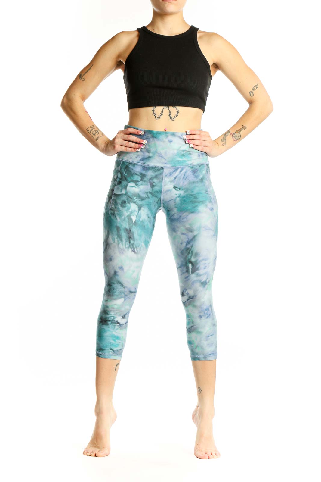 Front view of teal tie-dye capri leggings from Athleta
