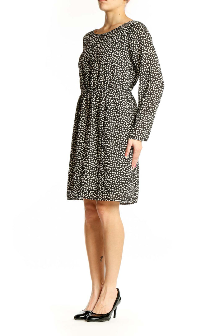 Front view of J.Crew Mercantile black polka dot long sleeve dress