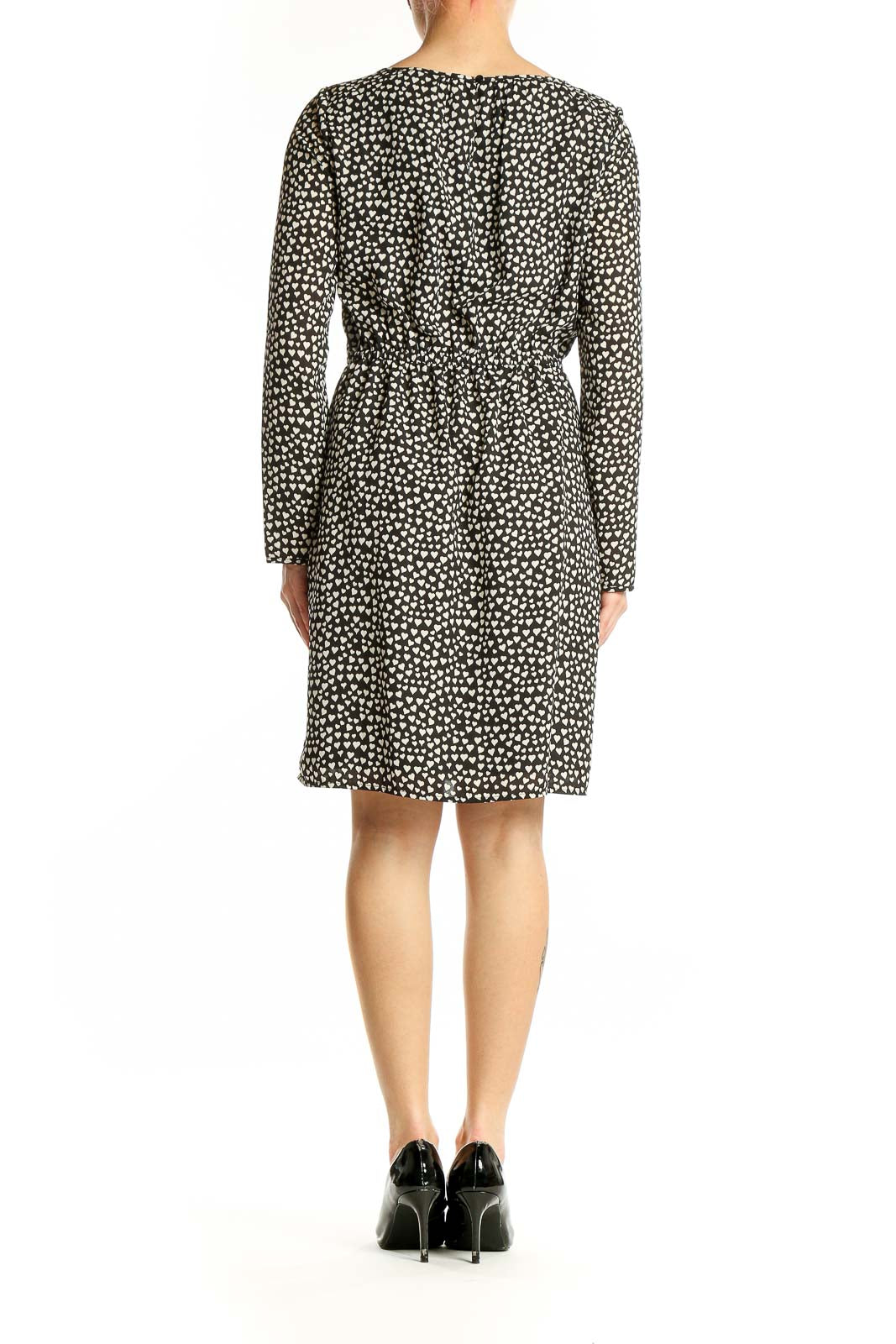 Side view of J.Crew Mercantile black polka dot long sleeve dress