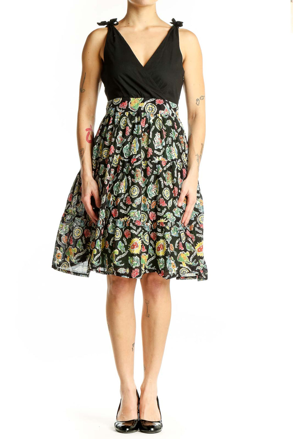 Front view of Maeve Black Floral Wrap Sundress with V-neck and tie shoulders