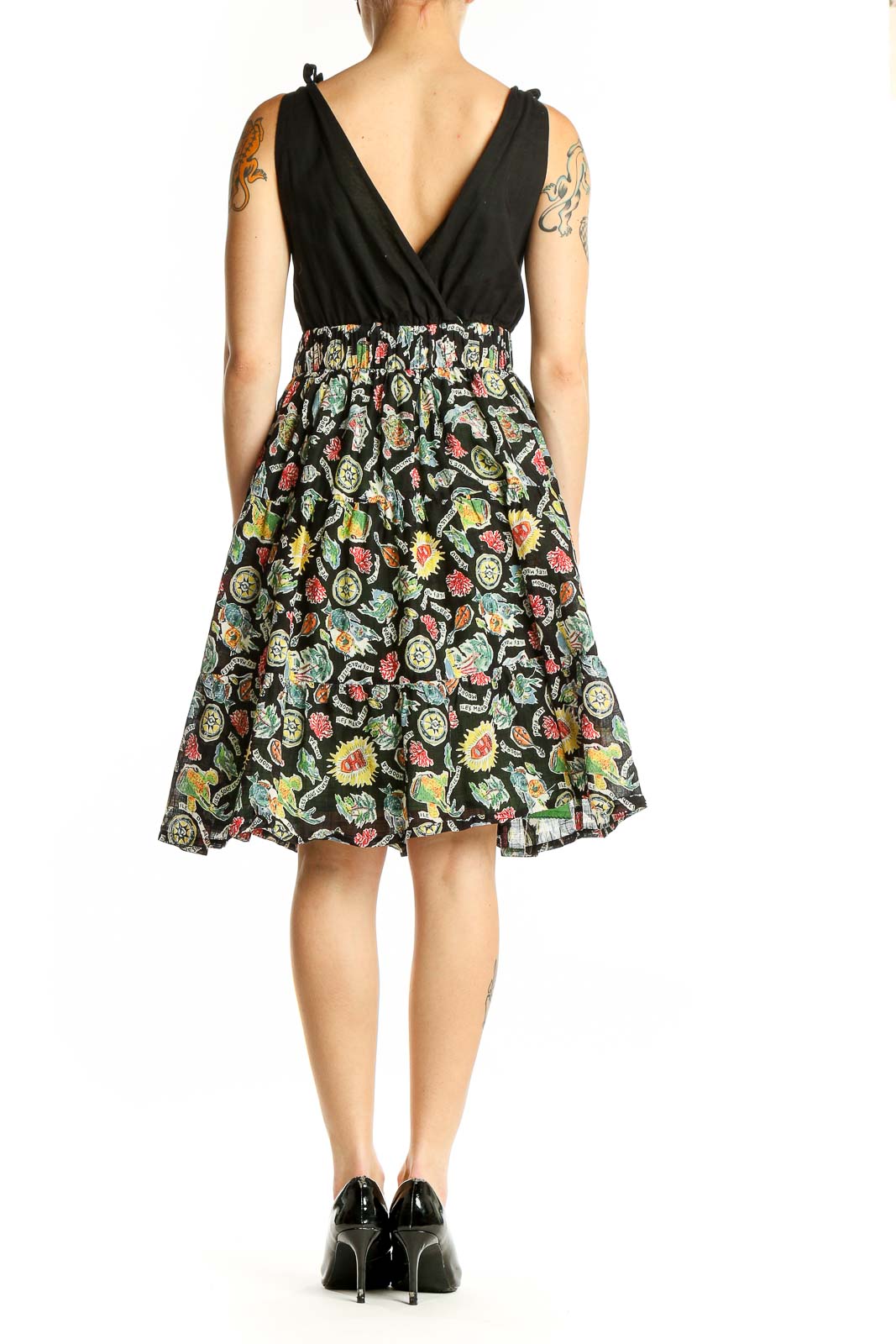 Side view of Maeve Black Floral Wrap Sundress showing floral print skirt