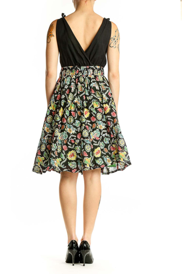 Side view of Maeve Black Floral Wrap Sundress showing floral print skirt