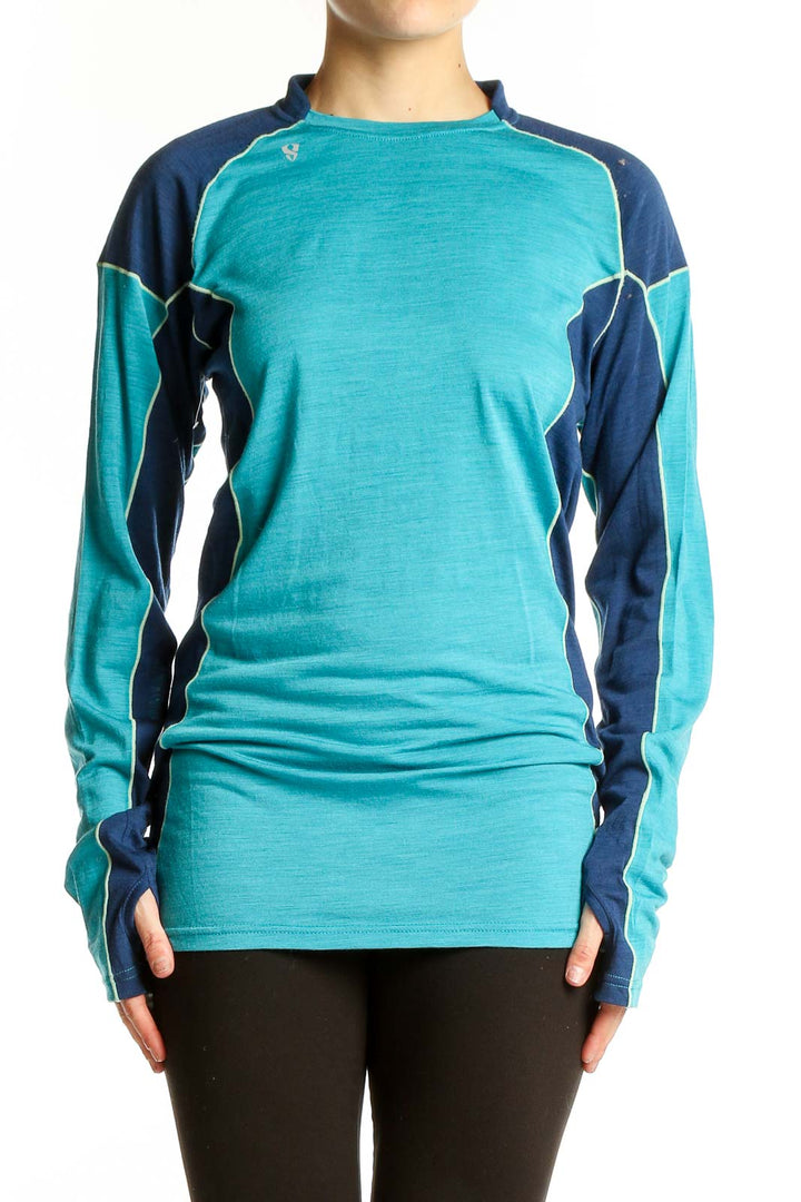 Front view of teal and navy color-block Stoic athletic top