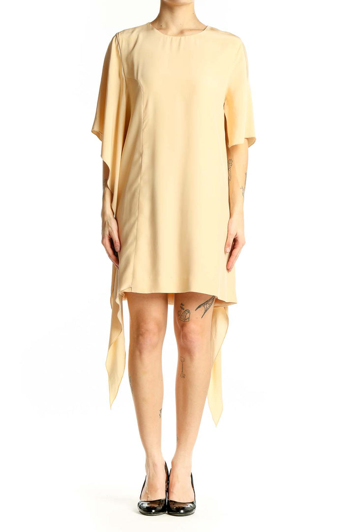 Front view of C/MEO Collective cream silk asymmetrical cocktail dress