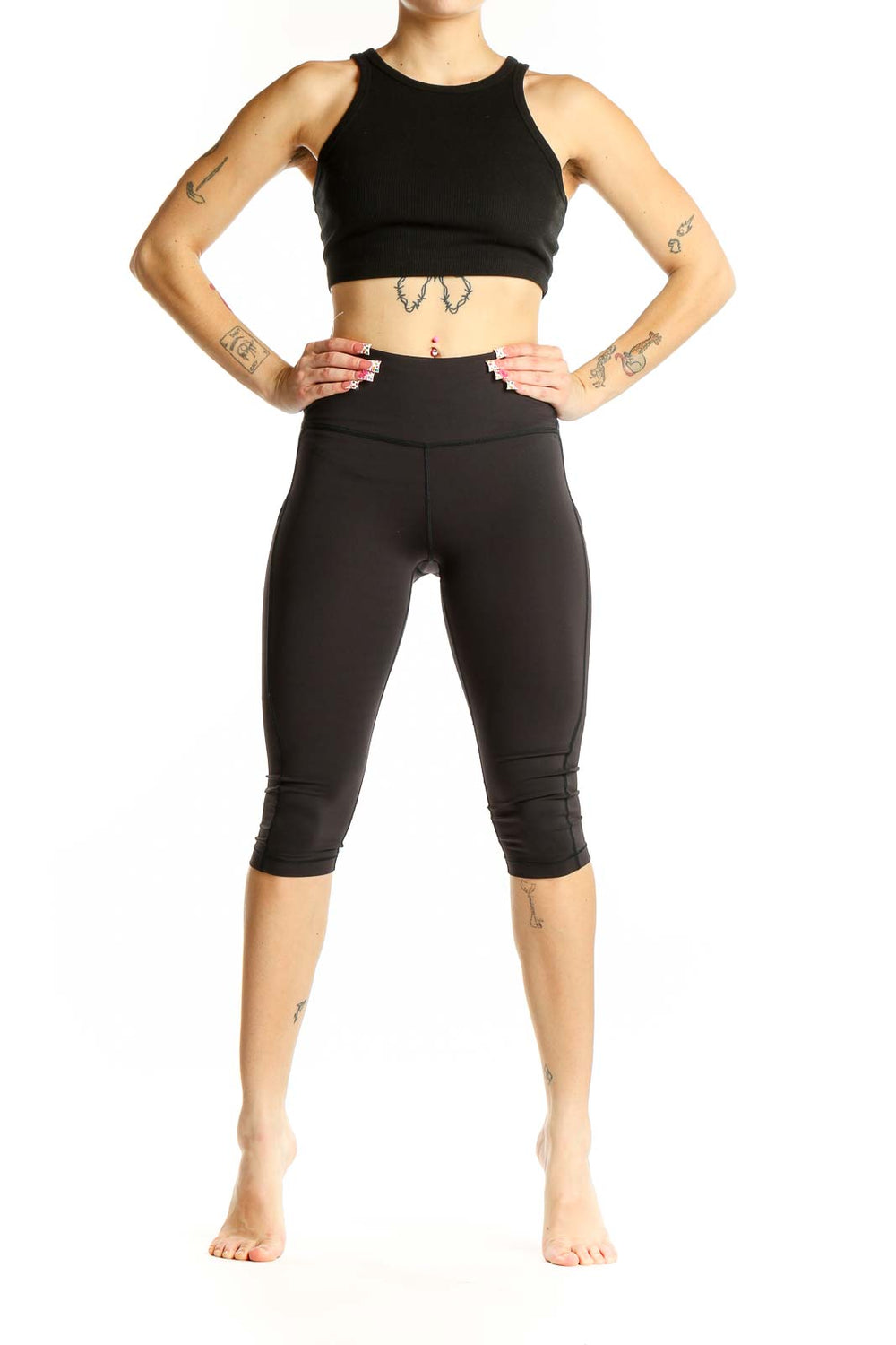 Front view of black Athleta high-waisted capri leggings
