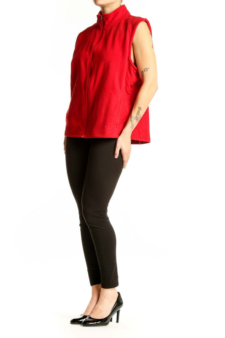 Front view of red Columbia polyester fleece vest with full-zip closure