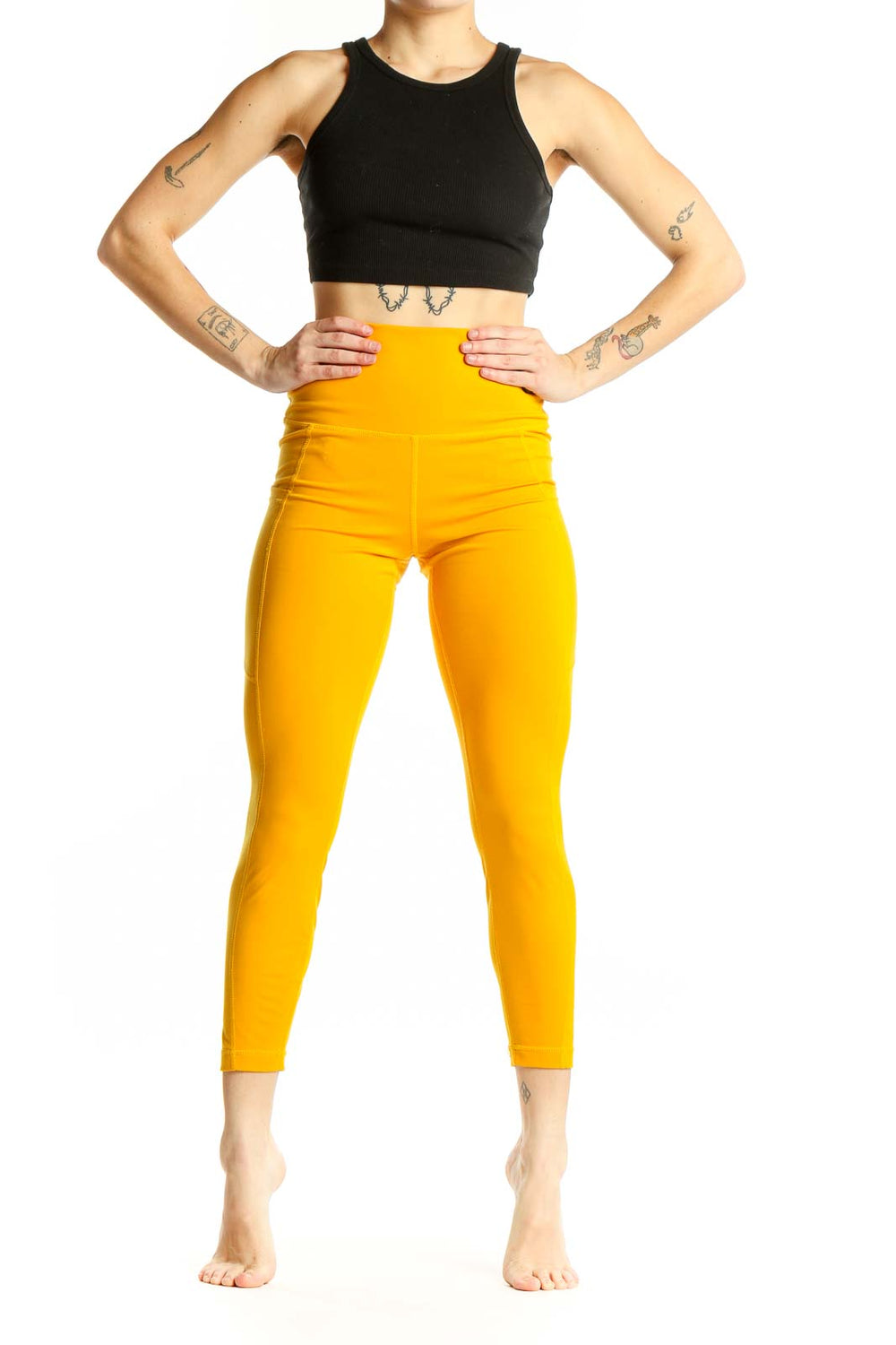 Front view of yellow high-waisted compression leggings from 90 Degree