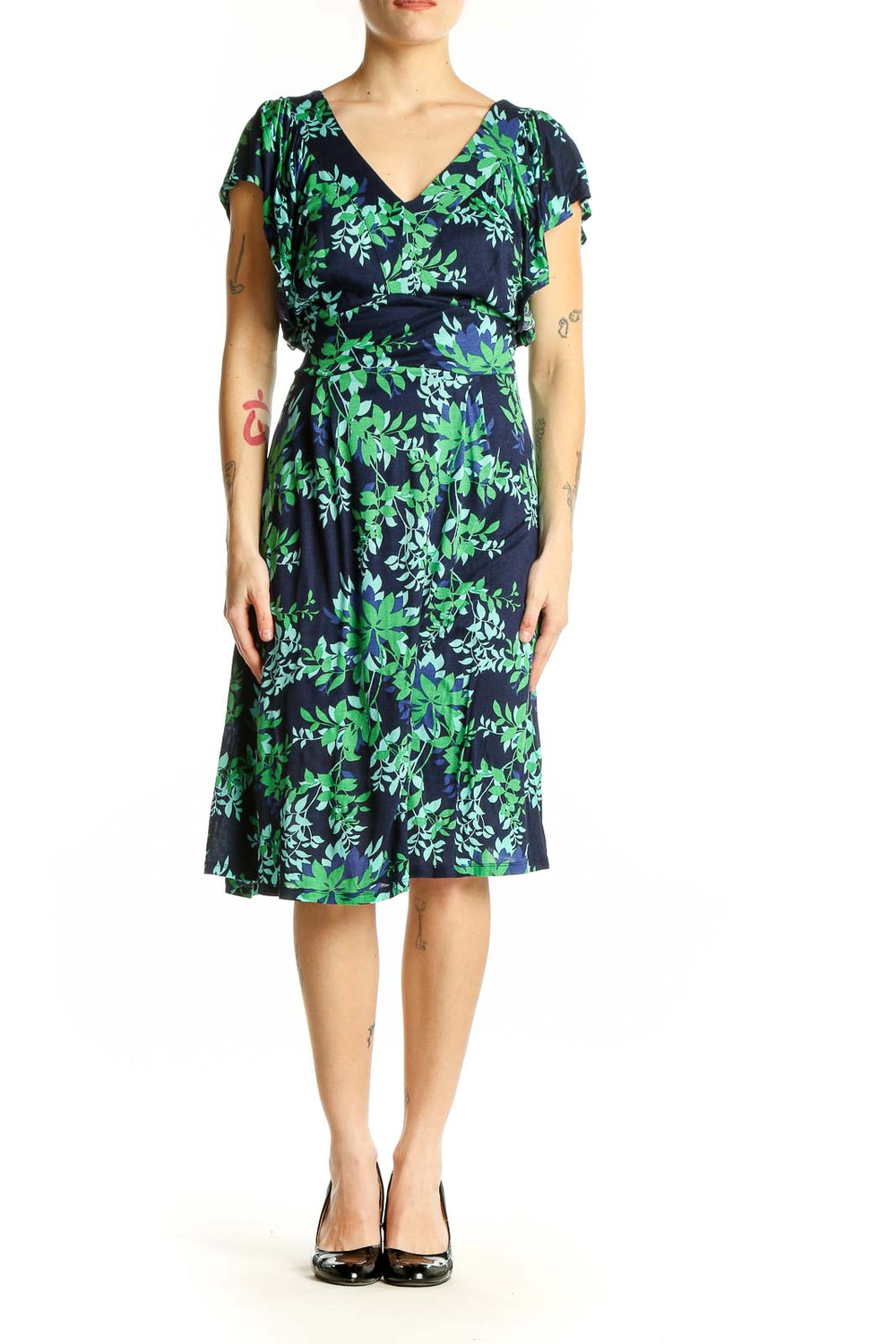 Front view of Boden navy midi dress with green floral print and flutter sleeves