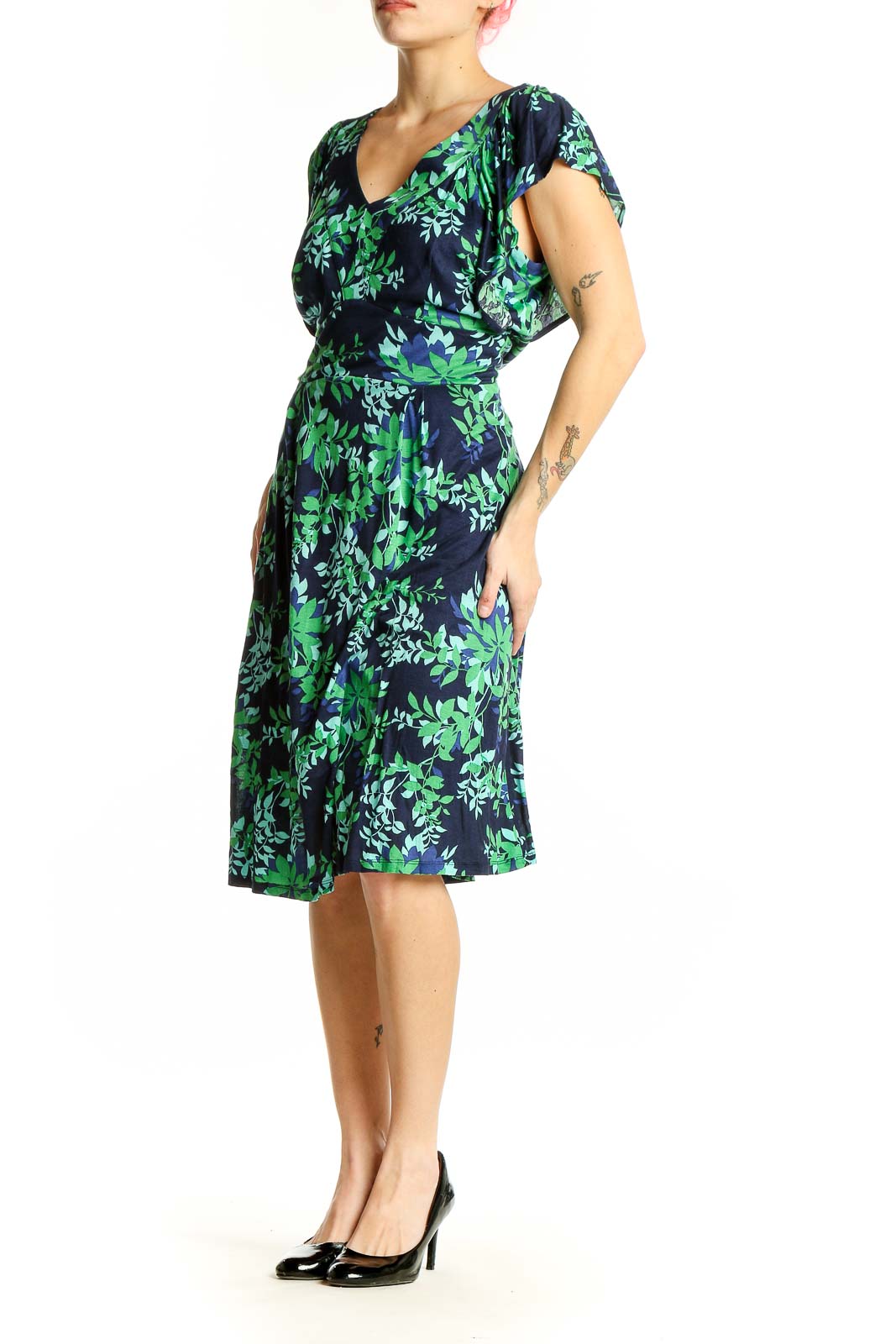 Front view of Boden navy midi dress with green floral print and flutter sleeves
