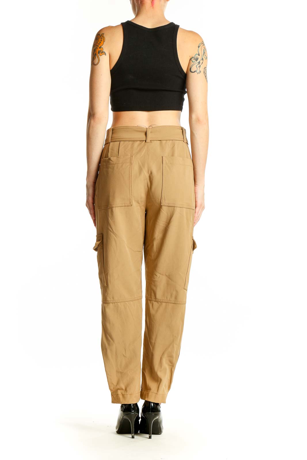 Side view of model wearing Banana Republic khaki cargo pants with black top