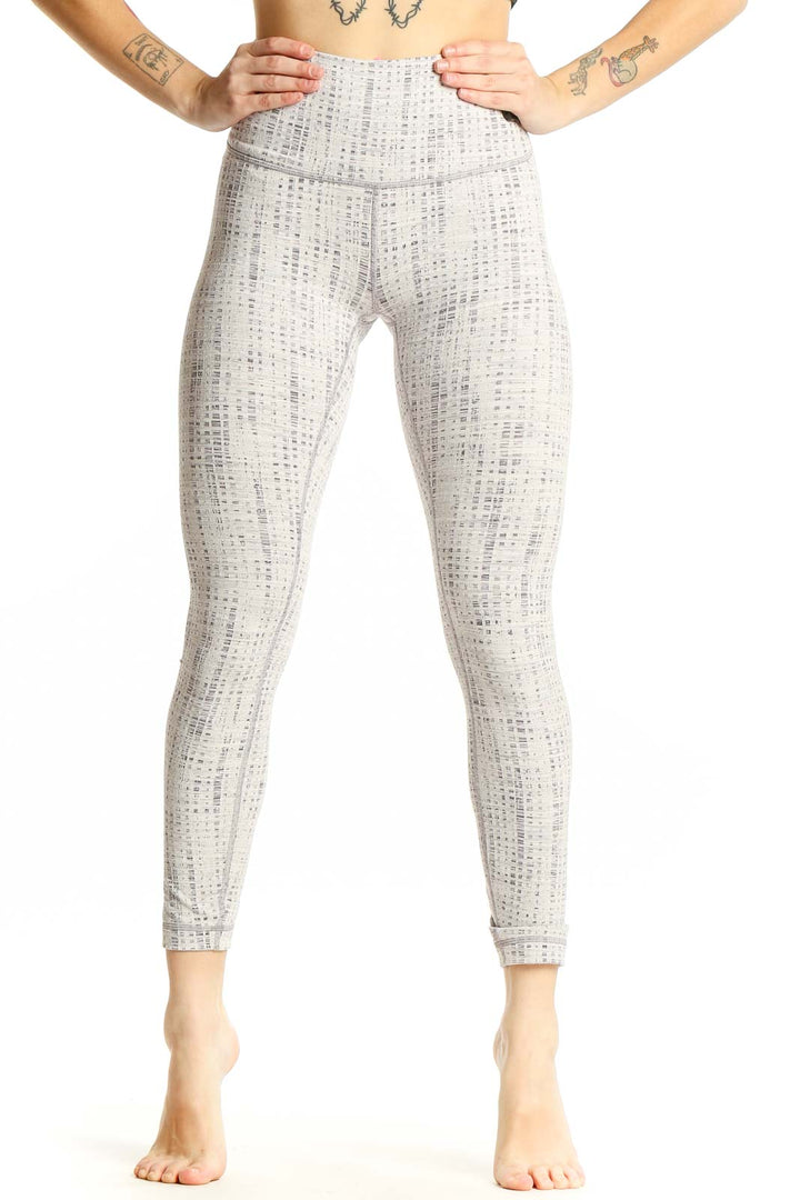Front view of white textured Lululemon high-waist yoga leggings