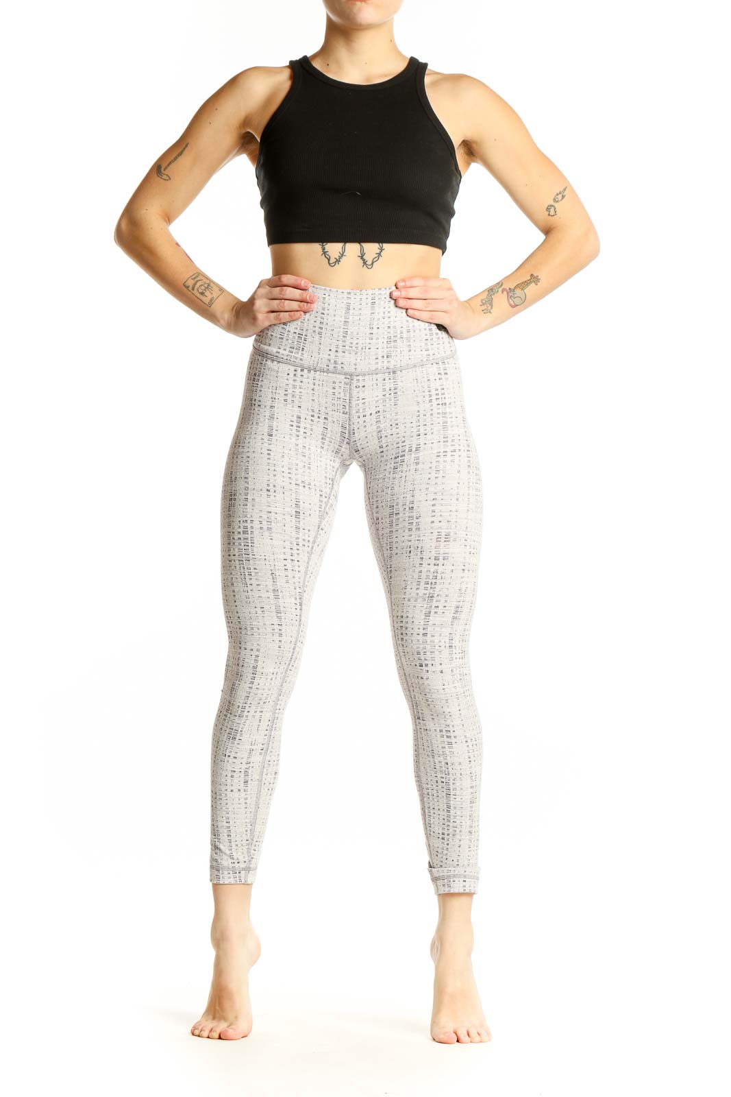 Front view of white textured Lululemon high-waist yoga leggings