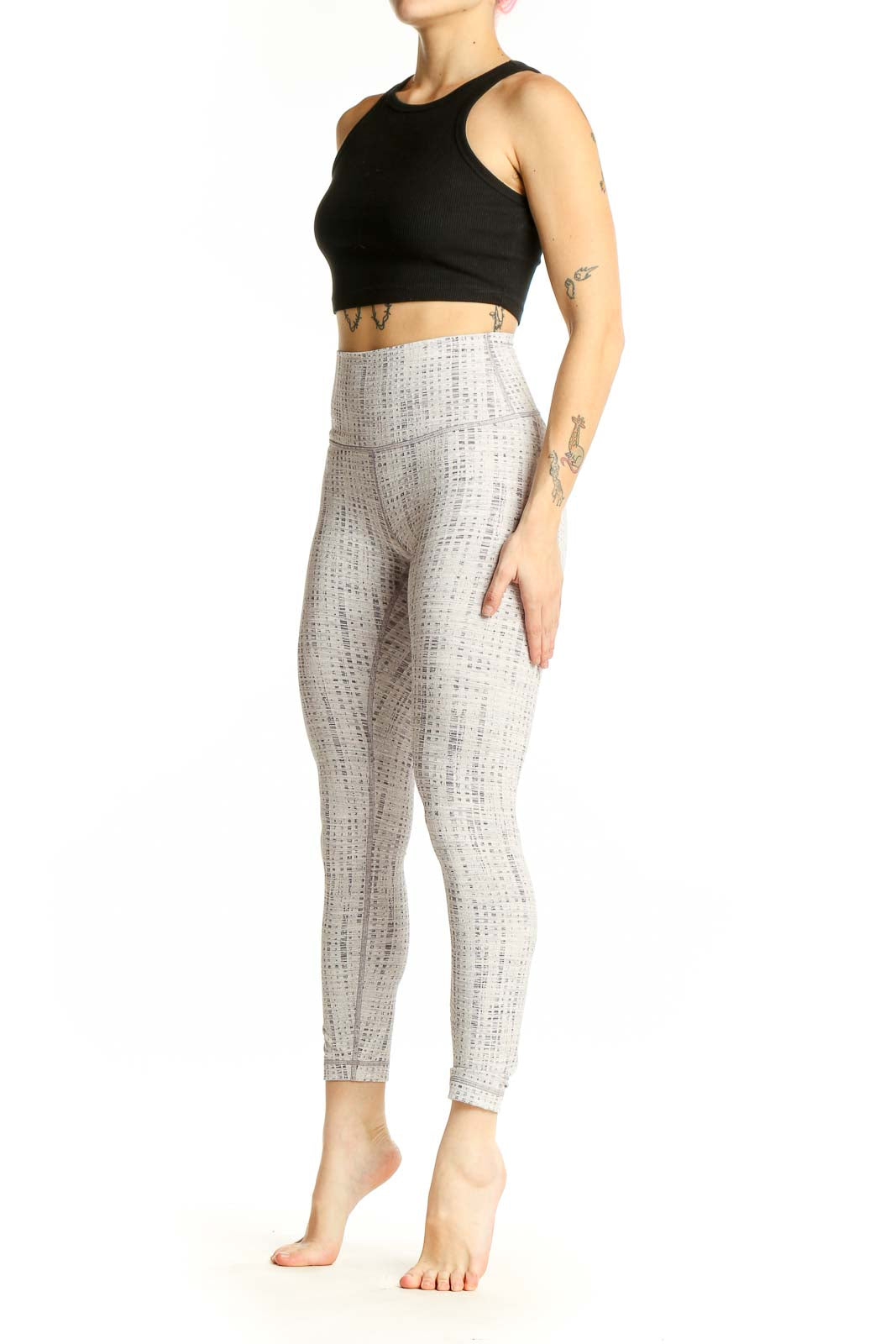 Front view of white textured Lululemon high-waist yoga leggings