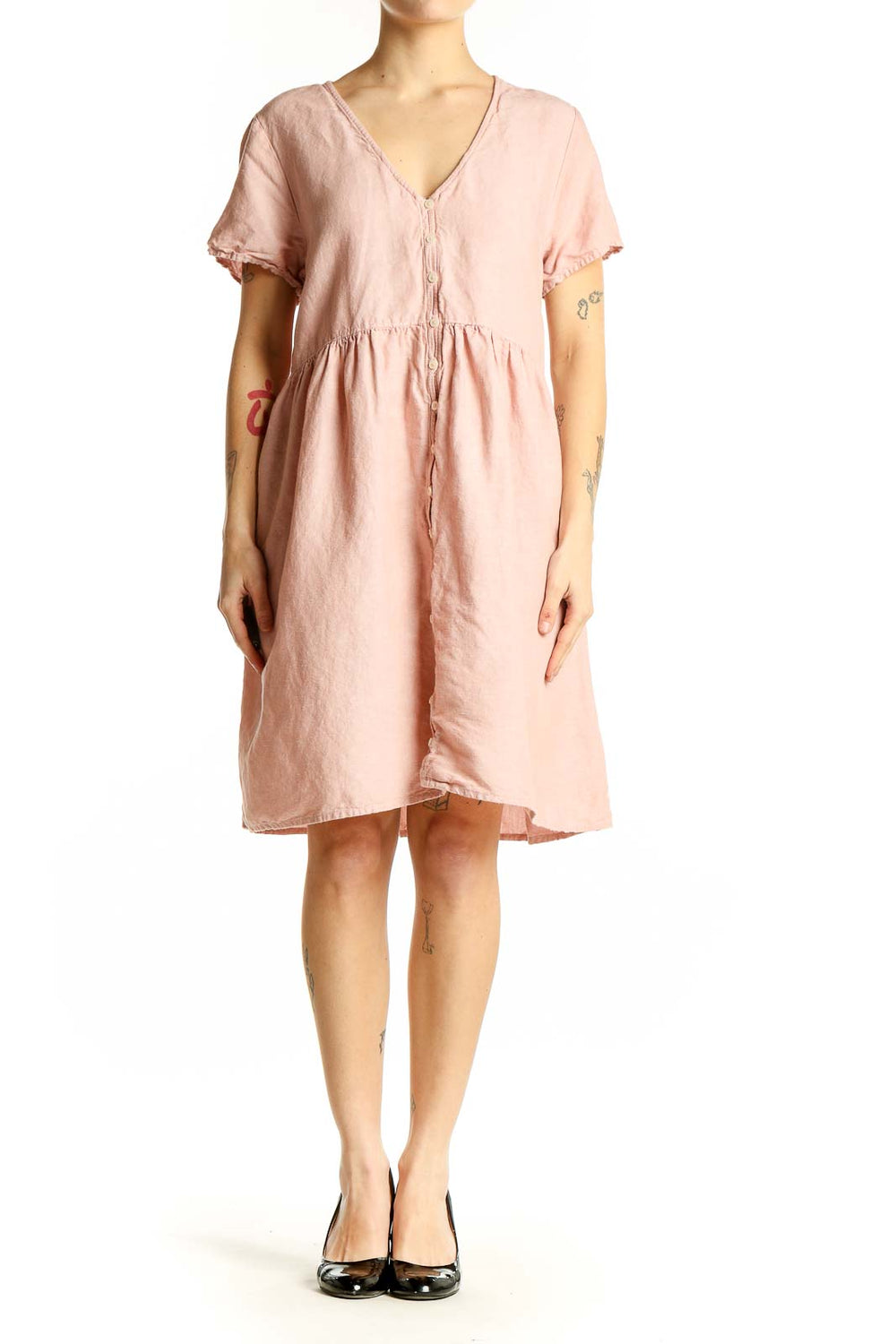 Front view of Madewell blush pink V-neck midi dress with button-down front