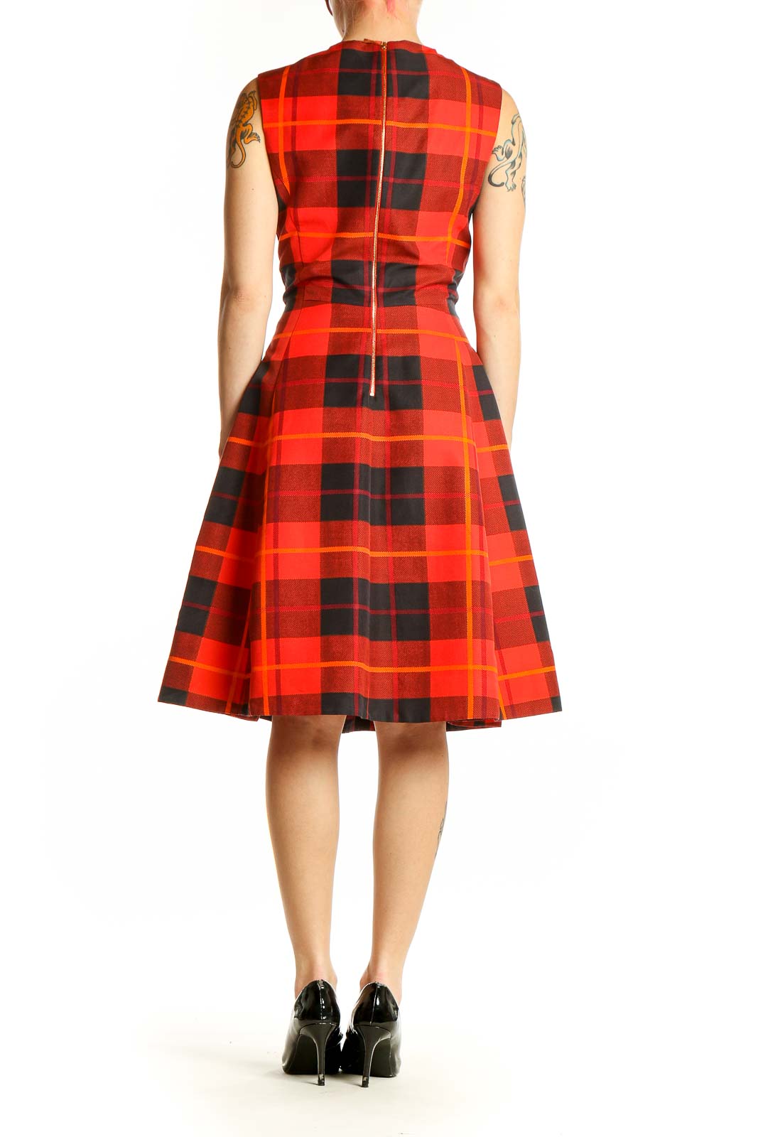 Side view of Kate Spade red plaid sleeveless dress showing pleated skirt