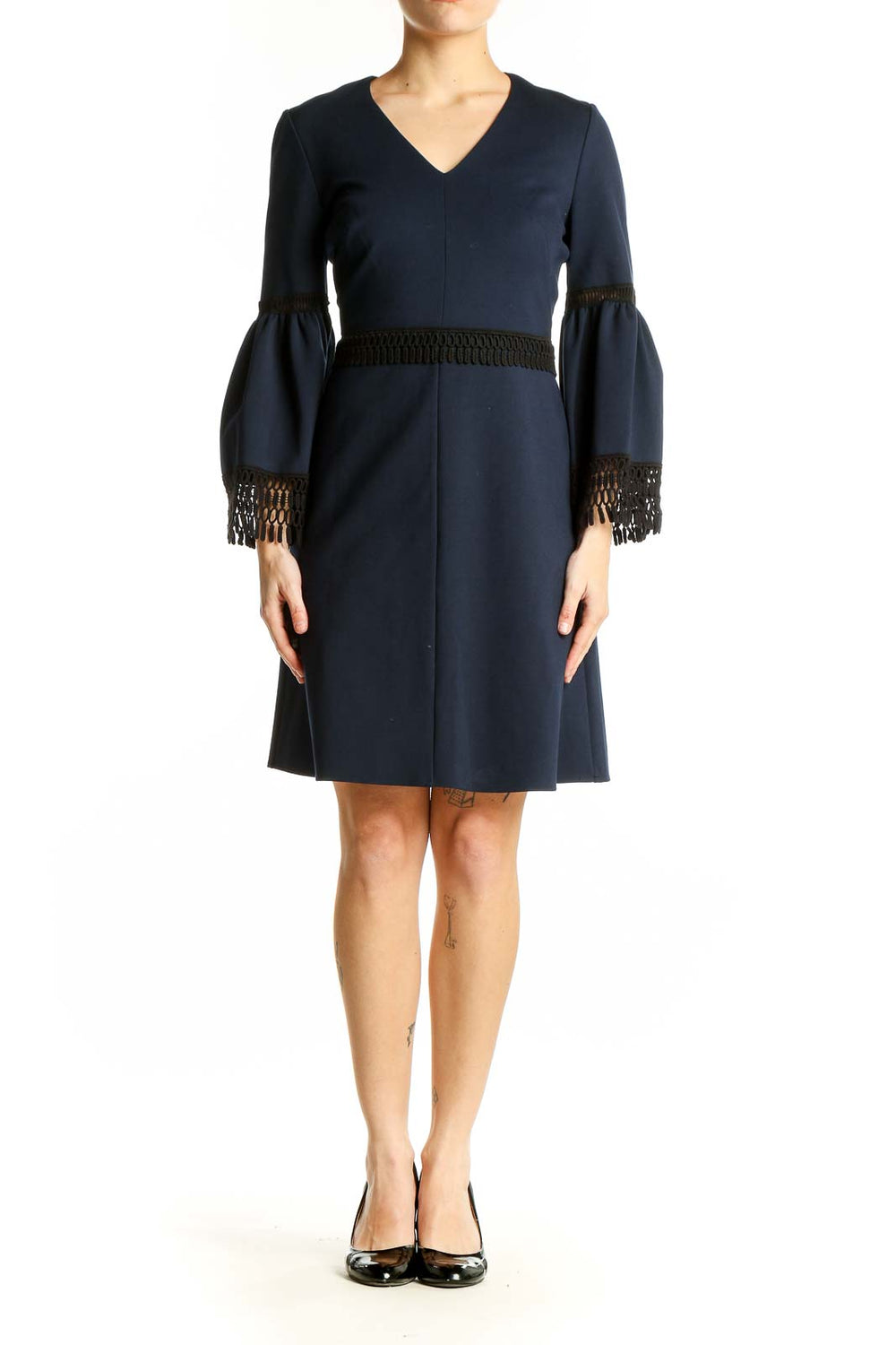 Front view of Kobi Halperin navy cocktail dress with bell sleeves and black fringe