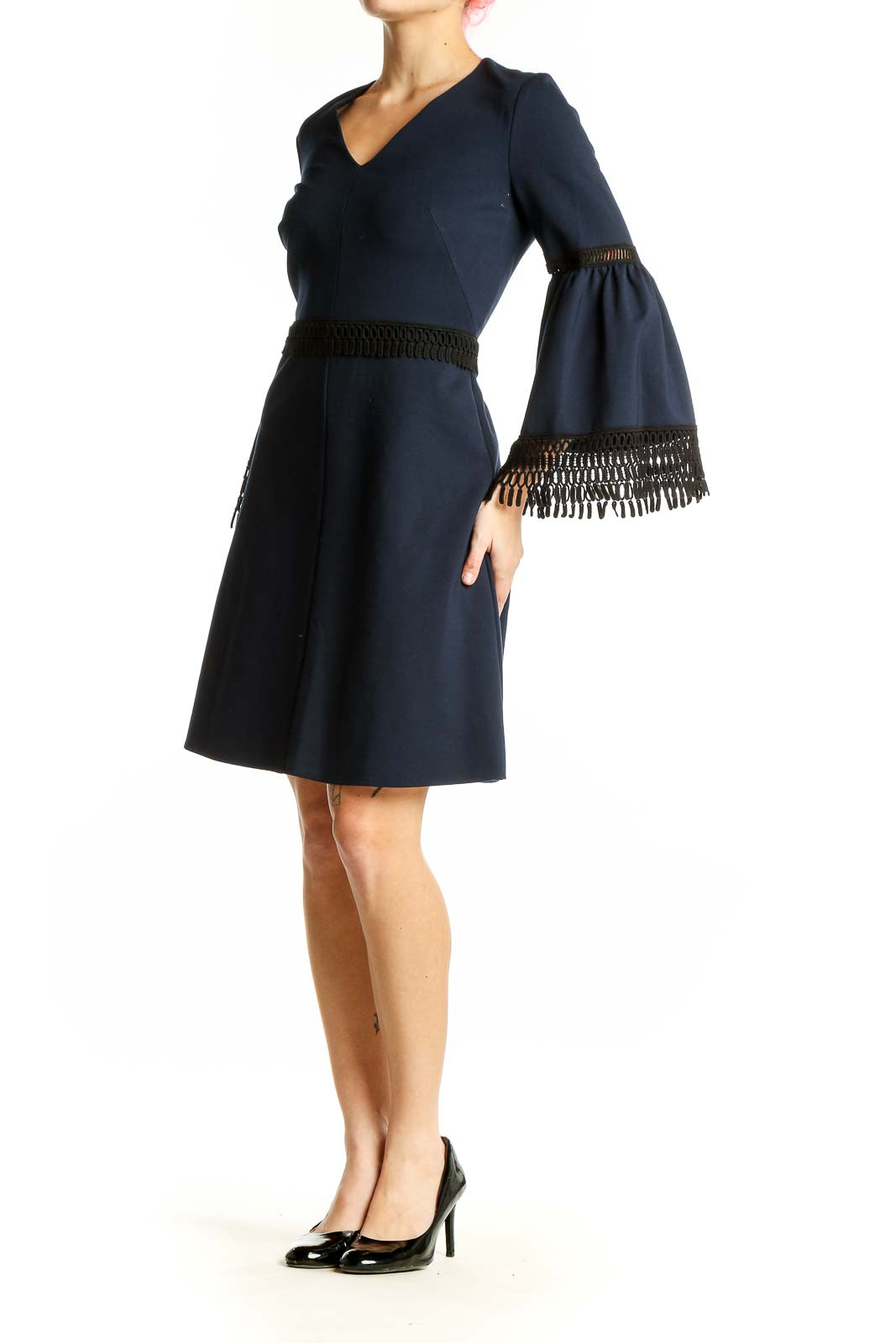 Front view of Kobi Halperin navy cocktail dress with bell sleeves and black fringe