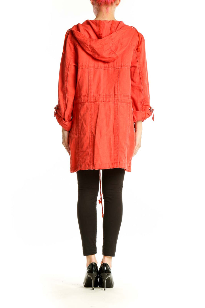 Side view of red Eddie Bauer hooded jacket on model