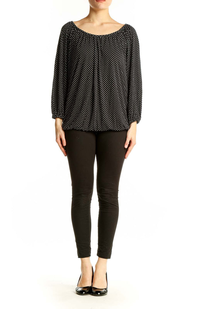 Front view of MICHAEL Michael Kors black polka dot blouse with scoop neck