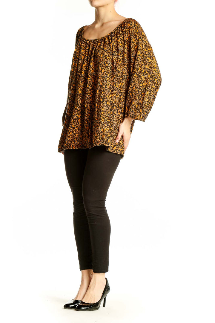 Front view of MICHAEL Michael Kors orange floral print peasant blouse with scoop neckline