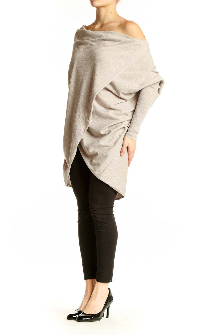 Front view of All Saints beige off-shoulder asymmetric knit sweater