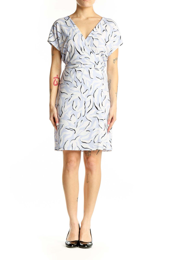 Front view of Nine West light blue abstract print wrap dress