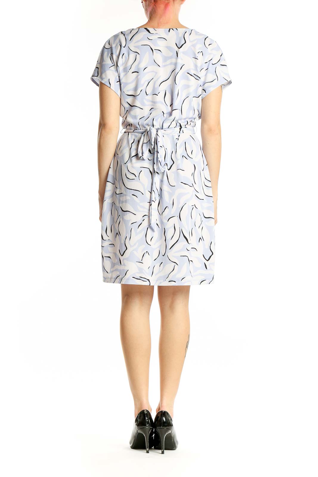 Side view of Nine West light blue abstract print wrap dress