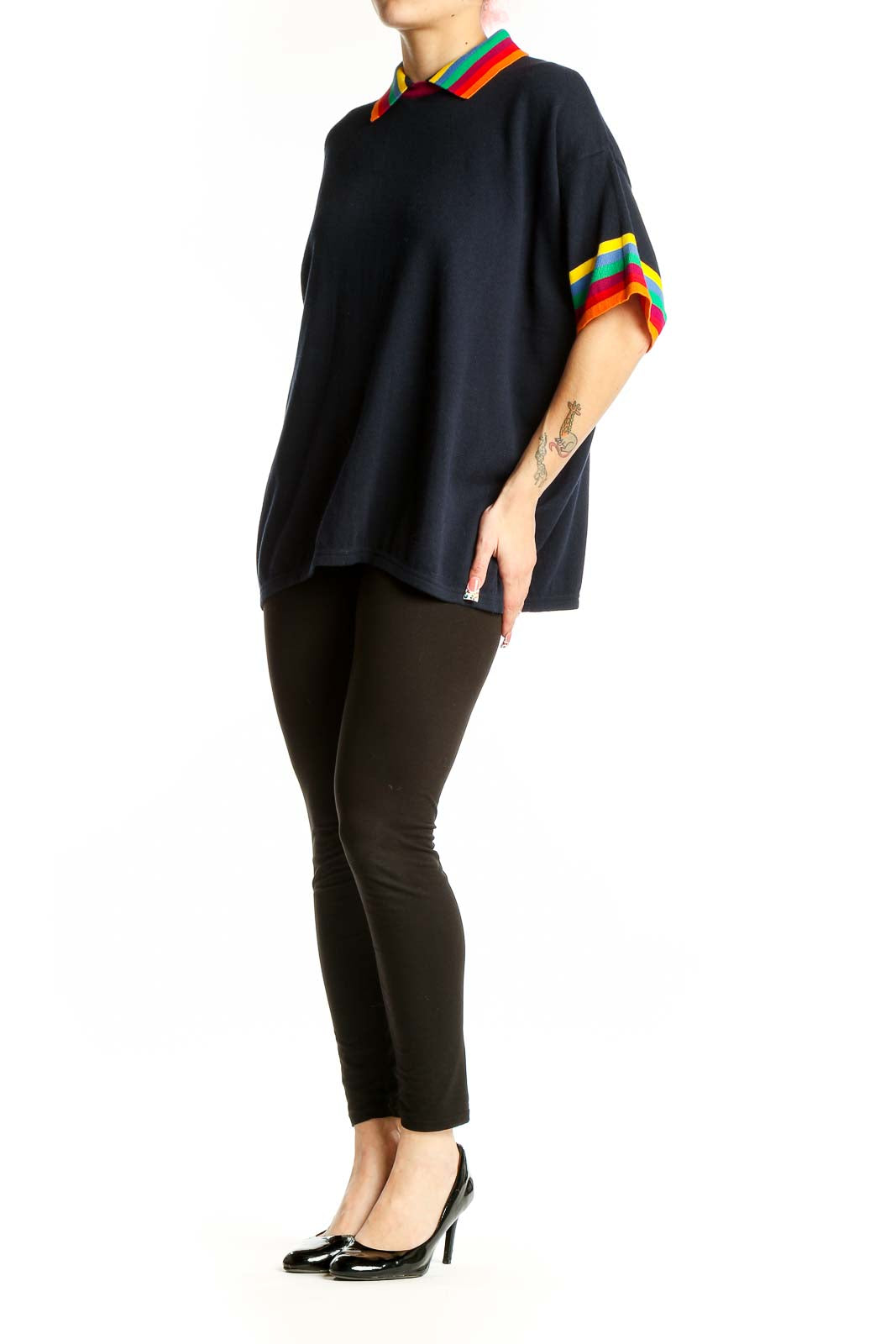 Front view of black United Colors of Benetton top with rainbow-striped collar