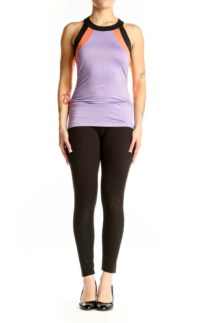 Front view of purple Reebok racerback tank top with black and coral color blocking