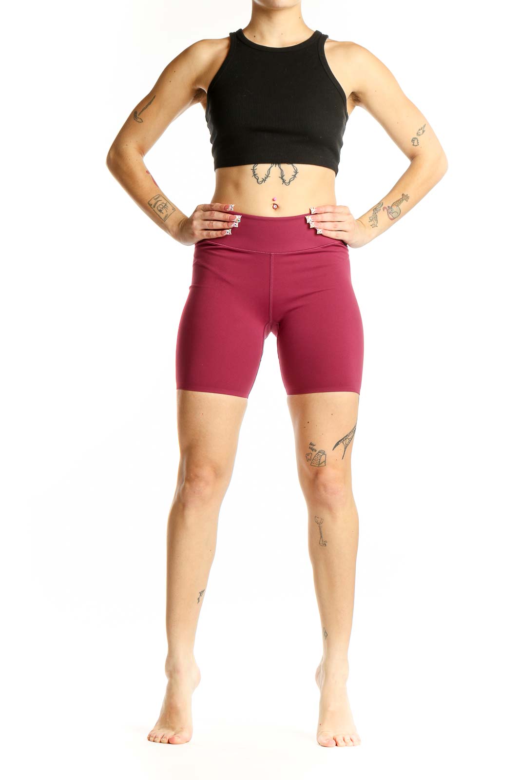 Front view of burgundy high-waisted compression shorts from Uniqlo