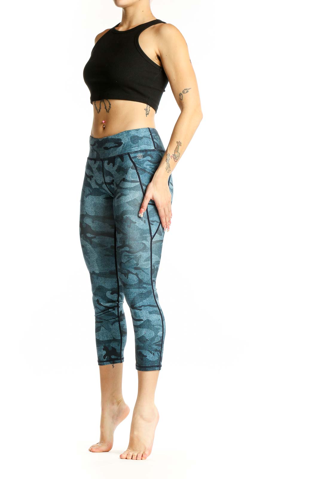 Front view of blue camo print capri leggings from Max Studio